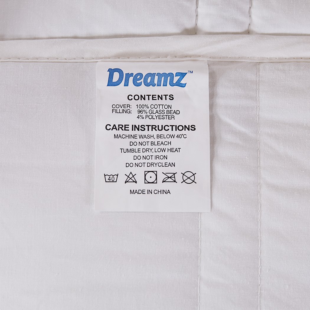 DreamZ Weighted Blanket in white, made of 100% hypoallergenic cotton, designed for adults to provide deep relaxation and stress relief.