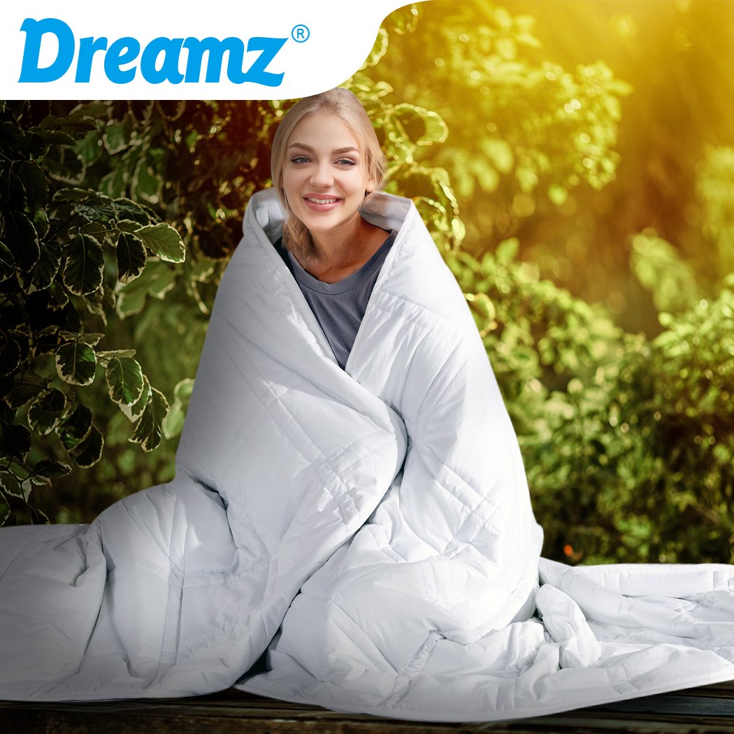 DreamZ Weighted Blanket in white, made of 100% hypoallergenic cotton, designed for adults to provide deep relaxation and stress relief.