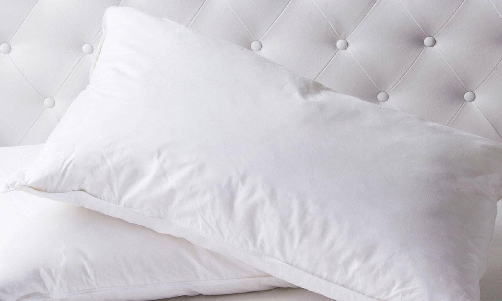 Luxurious Duck Feather & Down Quilt and Pillows set featuring soft cotton cover and premium fill for ultimate comfort.