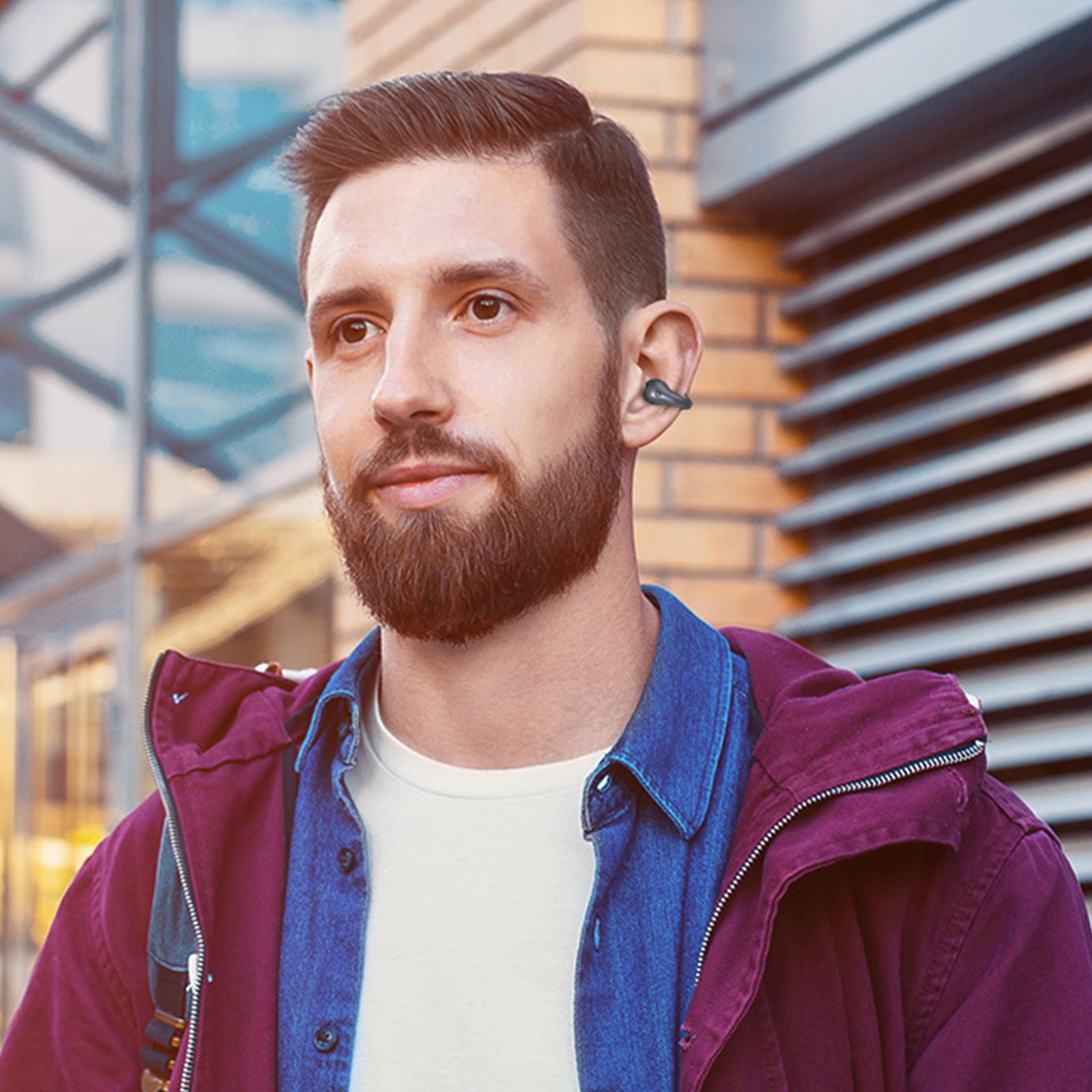 Ear-Clip Bluetooth 5.3 Stereo Earphones in black, showcasing waterproof design and ergonomic clip-on style for active use.