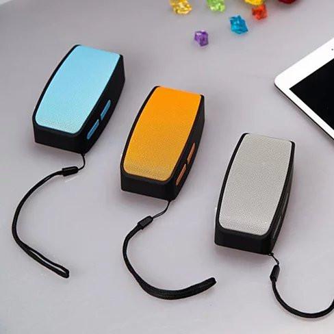 Easy Listener Bluetooth Speaker and MP3 player in bright colors, showcasing its compact design and built-in microphone.