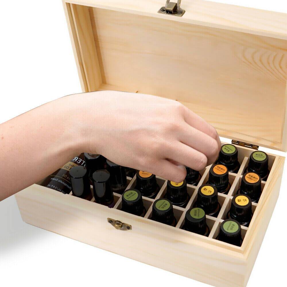 Wooden essential oil storage box with 25 slots for bottles, featuring a removable divider and sturdy construction.