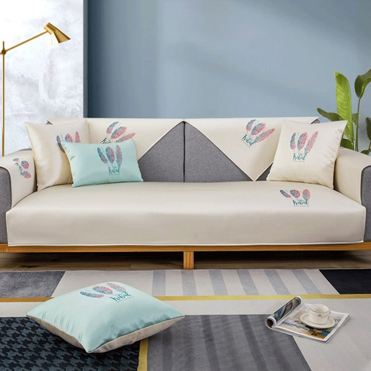 Feather Pattern Summer Ice Silk Non-slip Sofa Cover showcasing vibrant colors and silicone non-slip dots for stability.