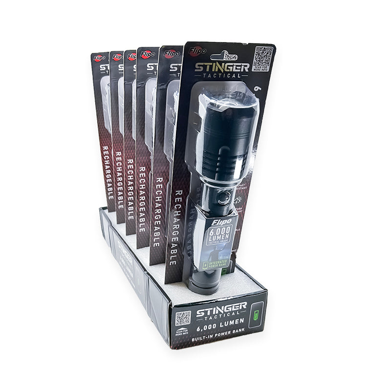 Flipo Stinger™ 6000 Lumen Tactical Flashlight displayed in a retail setting, showcasing its sleek design and features.