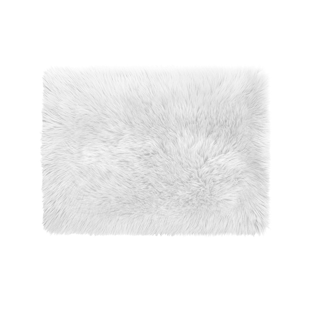 Luxurious white sheepskin shaggy rug with a plush texture, perfect for enhancing home decor in living rooms and bedrooms.
