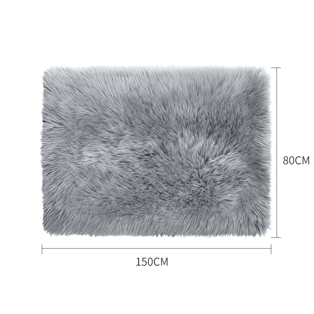Luxurious grey sheepskin shaggy rug with a plush 60-70mm pile, perfect for enhancing any living space.