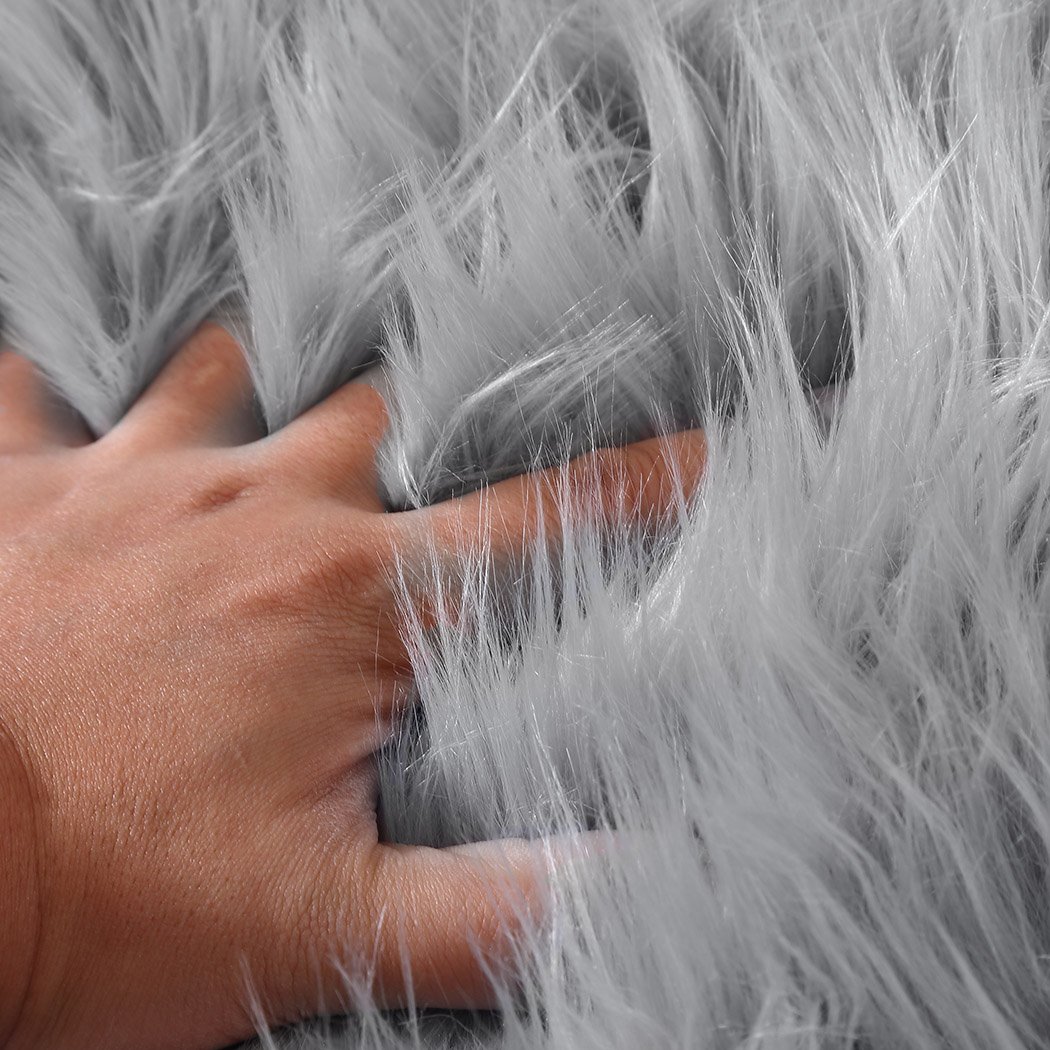 Luxurious grey sheepskin shaggy rug with a plush 60-70mm pile, perfect for enhancing any living space.