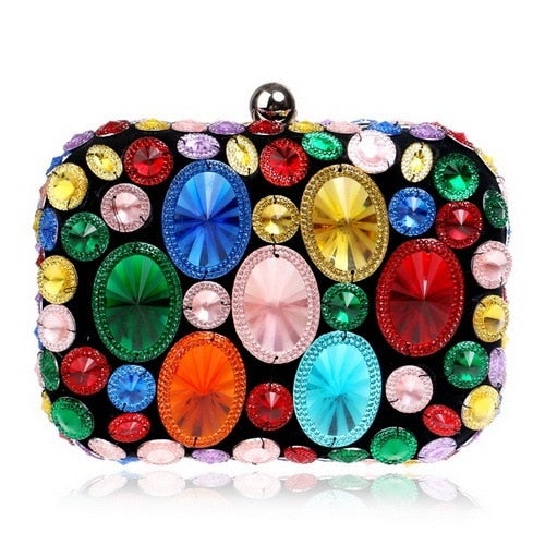 A vibrant Flower Candy Color Evening Bag adorned with diamonds, pearls, and floral decorations, perfect for weddings and parties.