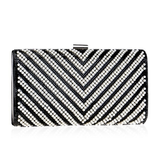 A vibrant Flower Candy Color Evening Bag adorned with diamonds, pearls, and floral decorations, perfect for weddings and parties.