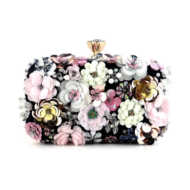 A vibrant Flower Candy Color Evening Bag adorned with diamonds, pearls, and floral decorations, perfect for weddings and parties.