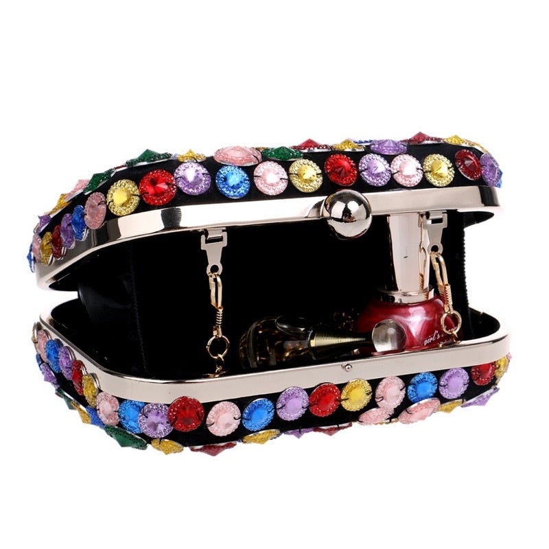 A vibrant Flower Candy Color Evening Bag adorned with diamonds, pearls, and floral decorations, perfect for weddings and parties.