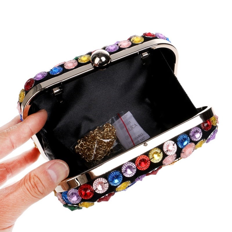 A vibrant Flower Candy Color Evening Bag adorned with diamonds, pearls, and floral decorations, perfect for weddings and parties.