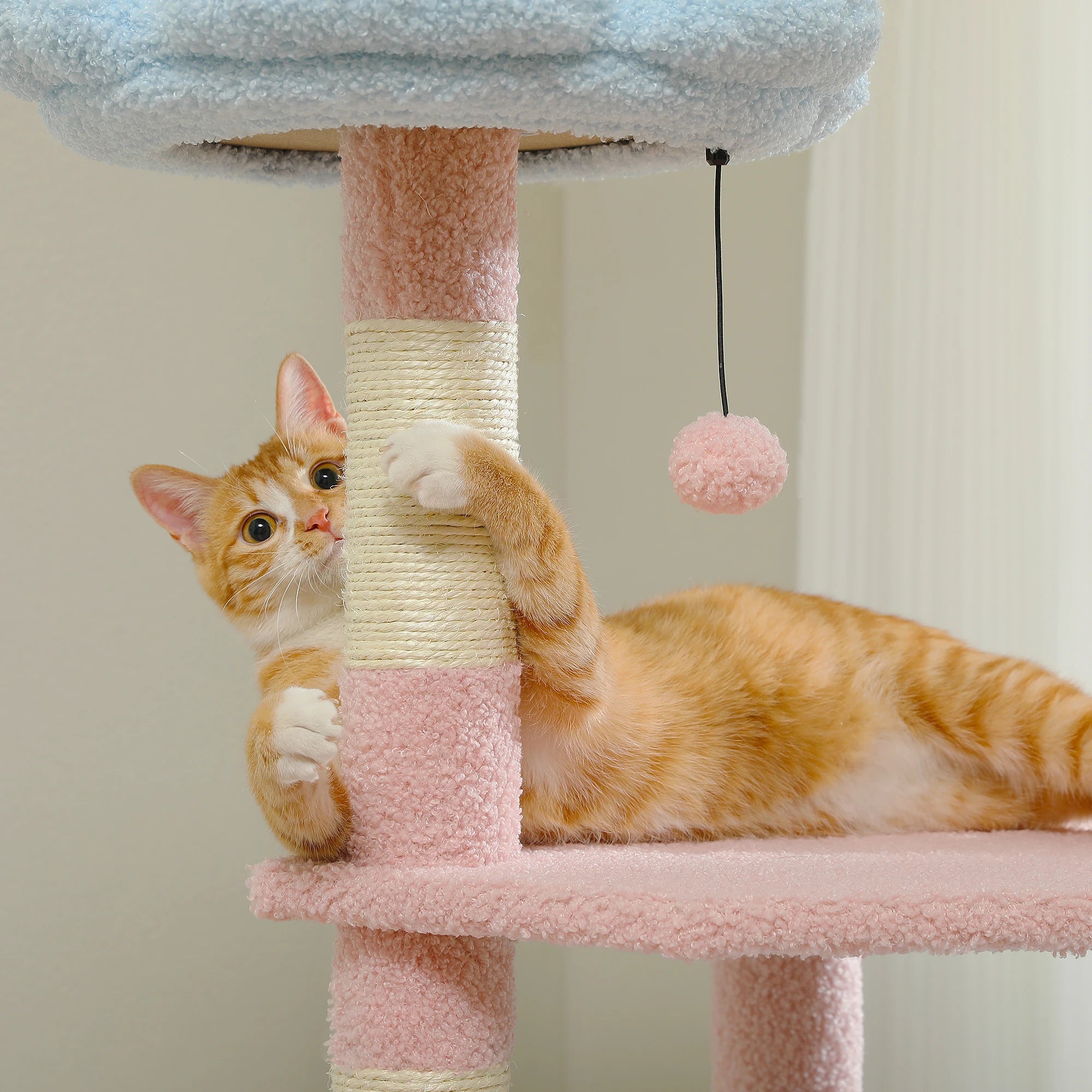 Multi-level Flower Cat Tree with sisal scratching posts, designed for playful cats, featuring vibrant colors and spacious platforms.