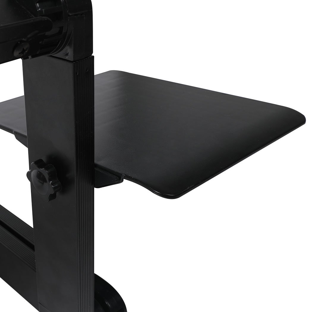 Foldable Laptop Desk with adjustable height and built-in cooling fans, featuring a removable mouse pad, designed for ergonomic comfort.