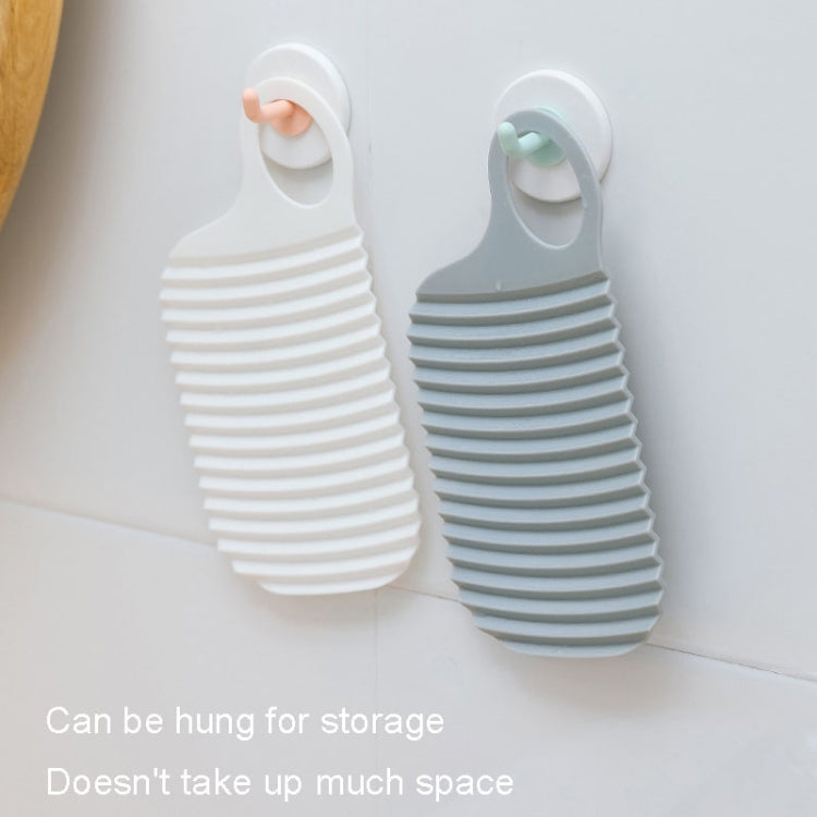 Foldable Soft Silicone Laundry Board in grey, featuring a smooth surface and convenient hanging holes for easy storage.