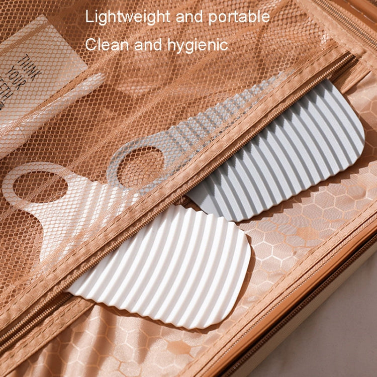 Foldable Soft Silicone Laundry Board in grey, featuring a smooth surface and convenient hanging holes for easy storage.