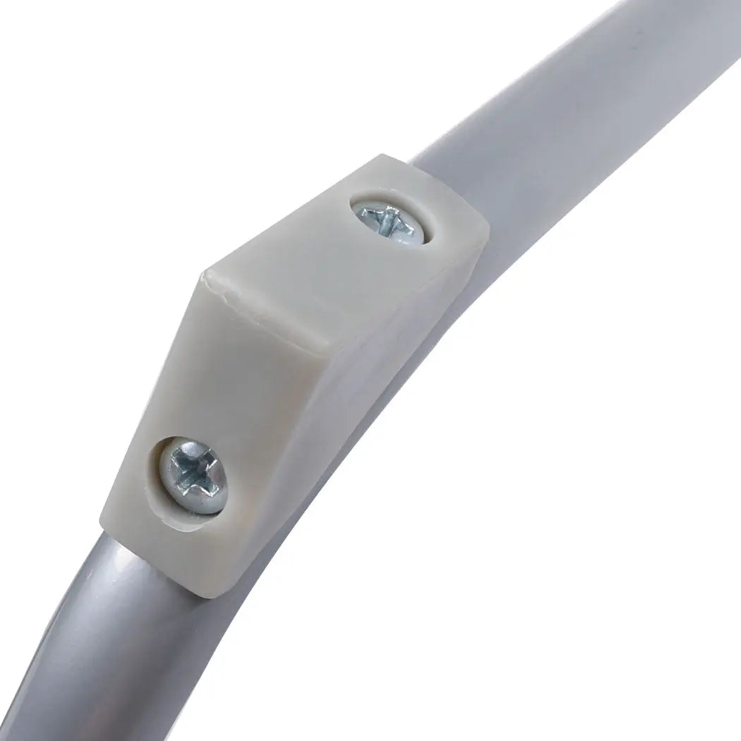 A lightweight and portable folding camping table made of aluminum, set up outdoors with a scenic background, perfect for picnics and camping.