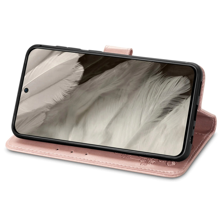 Rose-colored Four-leaf Clasp Embossed Leather Phone Case for Google Pixel 8, showcasing elegant design and functional features.