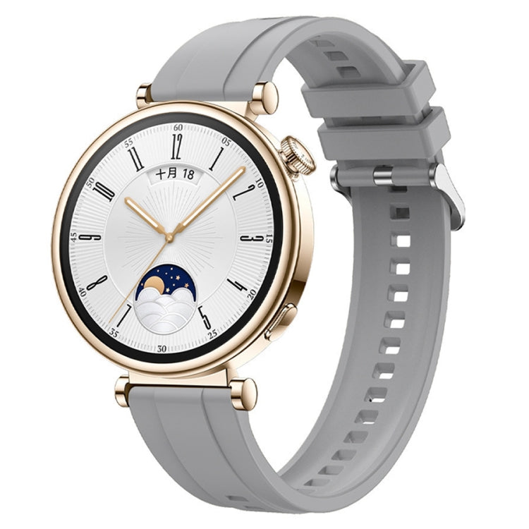 Tire pattern silicone watch strap for Huawei Watch GT4 41mm with silver buckle, showcasing its unique design and comfort.