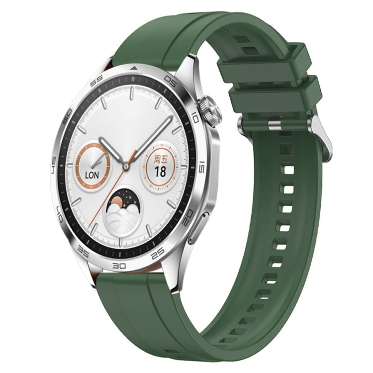 Tire pattern silicone watch strap with silver buckle for Huawei Watch GT4 46mm, showcasing its stylish design and comfortable fit.