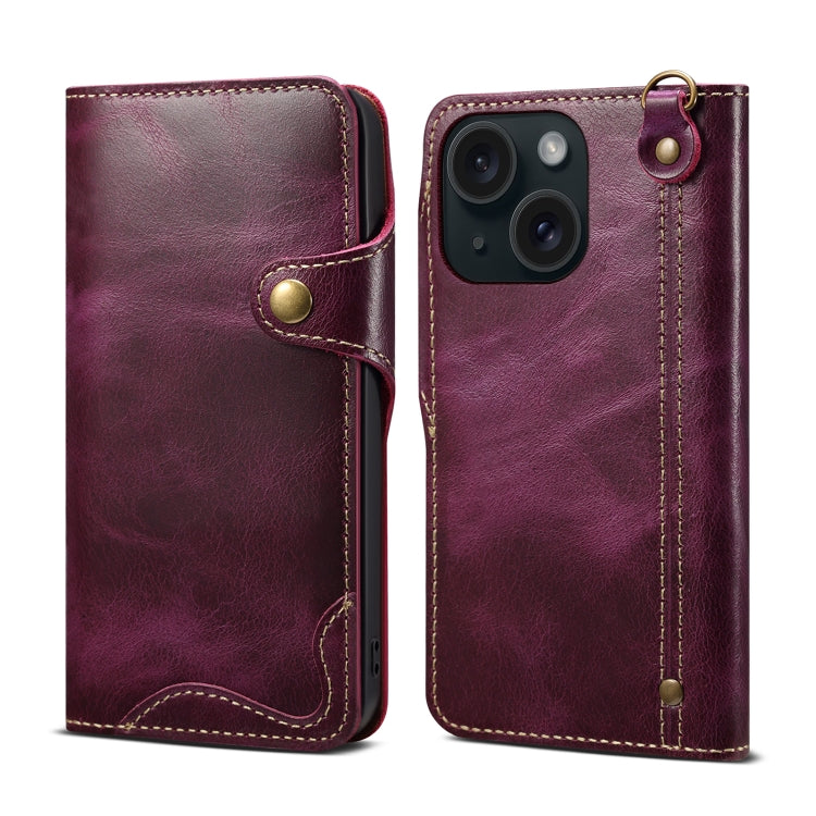 Denior Oil Wax Cowhide Magnetic Button Genuine Leather Case for iPhone 13, showcasing its luxurious texture and card slots.
