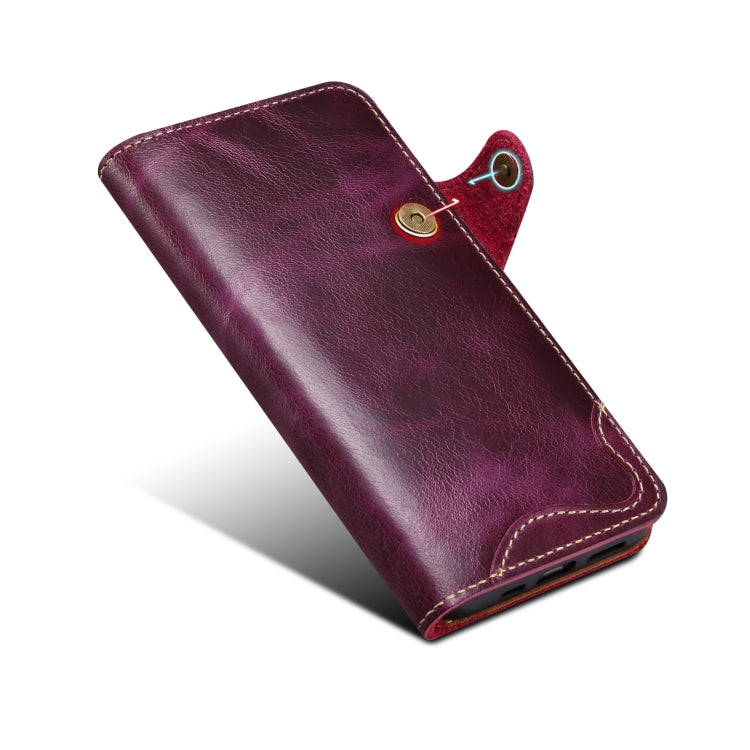 Denior Oil Wax Cowhide Magnetic Button Genuine Leather Case for iPhone 13, showcasing its luxurious texture and card slots.