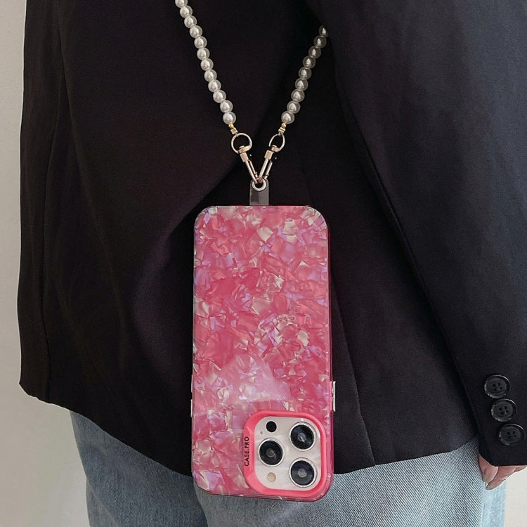 For iPhone 14 Pro Max Shell Texture Crossbody Pearl Chain TPU Hybrid case showcasing its elegant design and pearl chain.