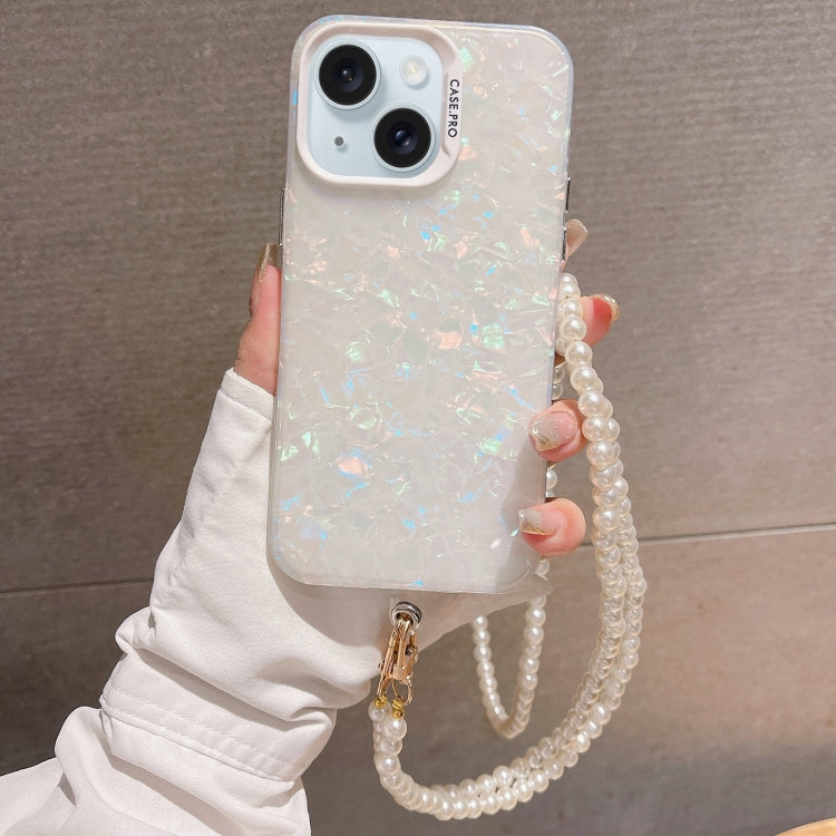For iPhone 15 Plus Shell Texture Crossbody Case featuring a pearl chain, showcasing its stylish design and durable TPU material.