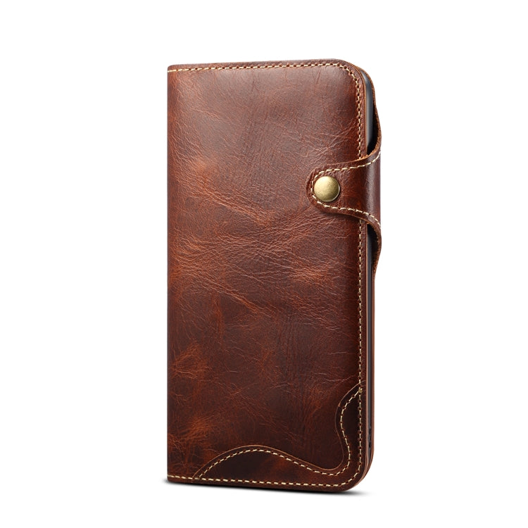 Denior Oil Wax Cowhide Magnetic Button Case for iPhone 15 Pro Max, showcasing its luxurious leather texture and card slots.