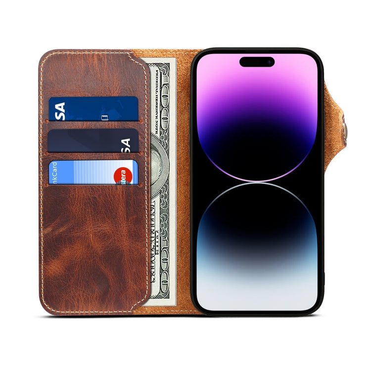 Denior Oil Wax Cowhide Magnetic Button Case for iPhone 15 Pro Max, showcasing its luxurious leather texture and card slots.