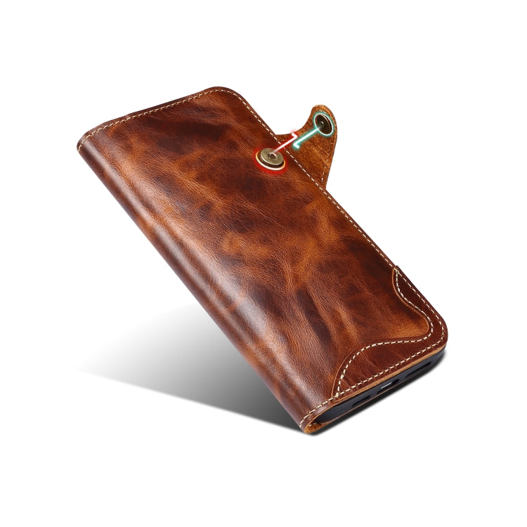 Denior Oil Wax Cowhide Magnetic Button Case for iPhone 15 Pro Max, showcasing its luxurious leather texture and card slots.