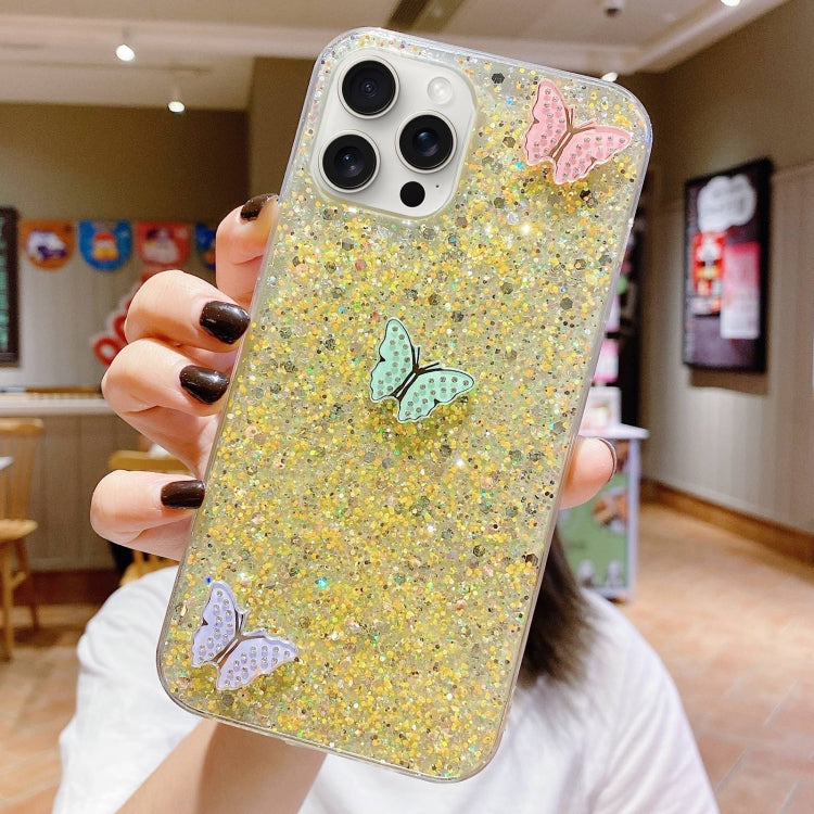 Stylish iPhone 15 Pro Max case featuring colorful rhinestone butterflies and a starry sequin design, made from durable epoxy TPU material.