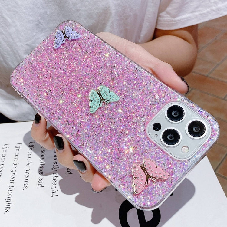 Stylish iPhone 15 Pro Max case featuring colorful rhinestone butterflies and a starry sequin design, made from durable epoxy TPU material.