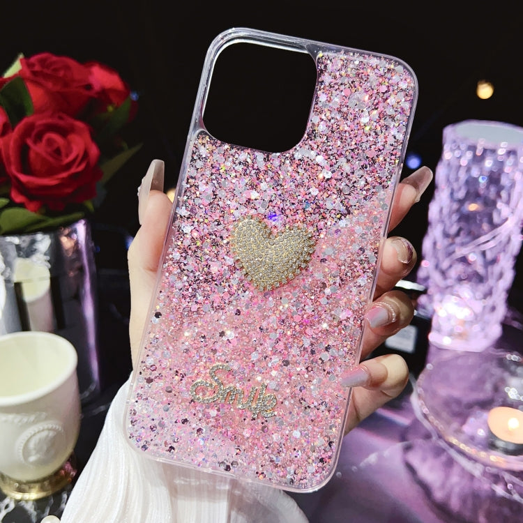 Pink epoxy TPU phone case for iPhone 15 featuring a starry sequin diamond heart design, showcasing durability and style.