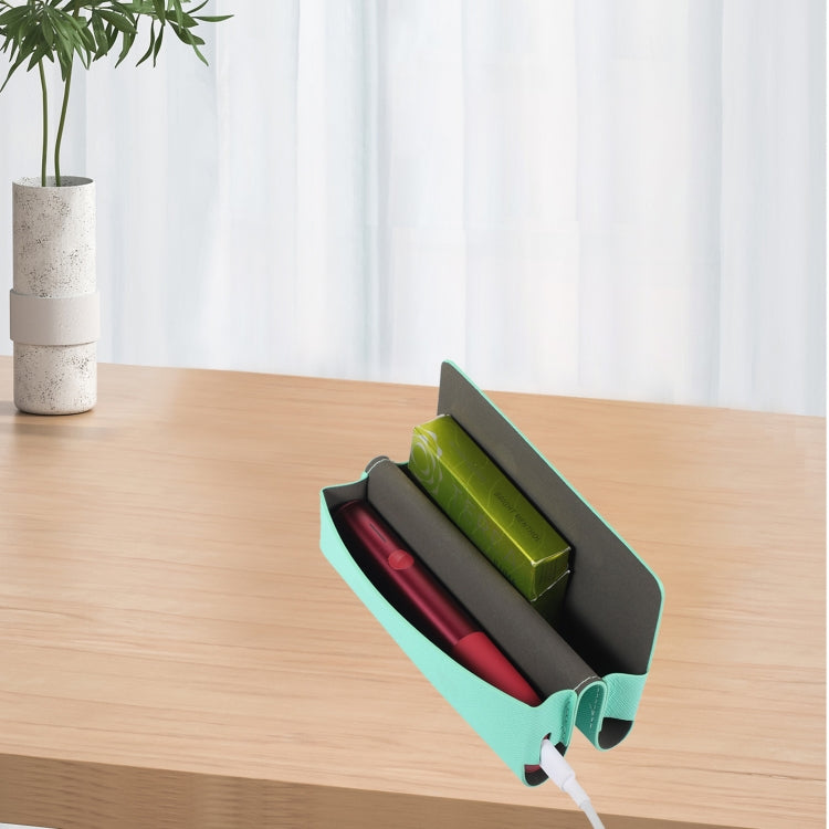 Mint leather storage bag for IQOS ILUMA ONE, featuring a cross pattern design, lightweight and portable for easy carrying.