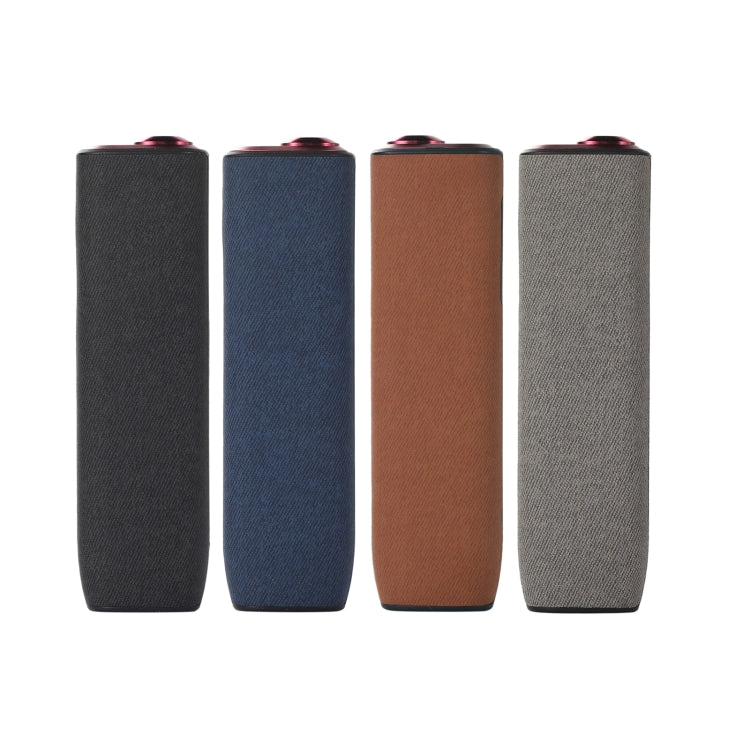 Four rectangular, fabric-covered Bluetooth speakers.