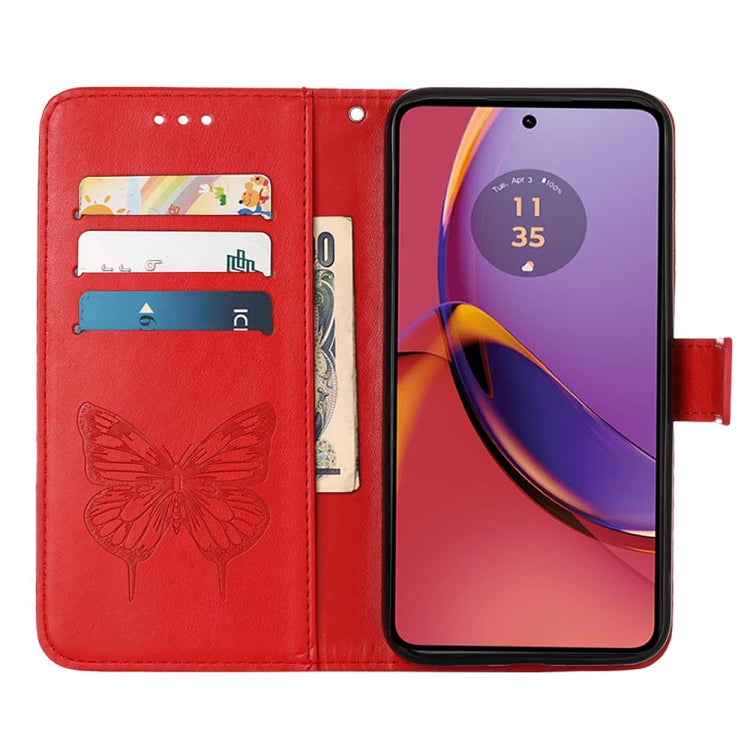 Red embossed butterfly leather phone case for Motorola Moto G84, showcasing its stylish design and functional features.