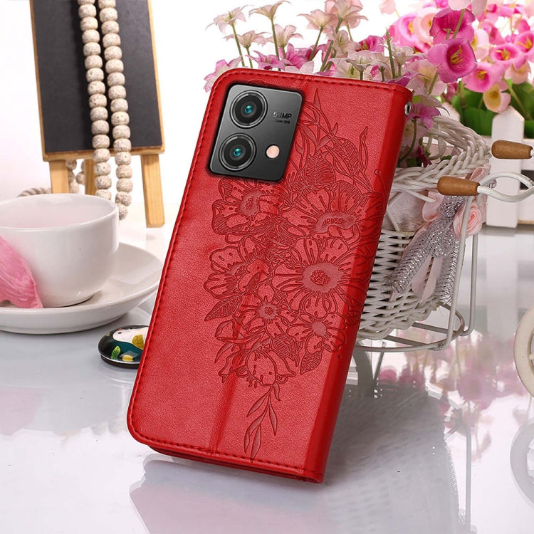 Red embossed butterfly leather phone case for Motorola Moto G84, showcasing its stylish design and functional features.