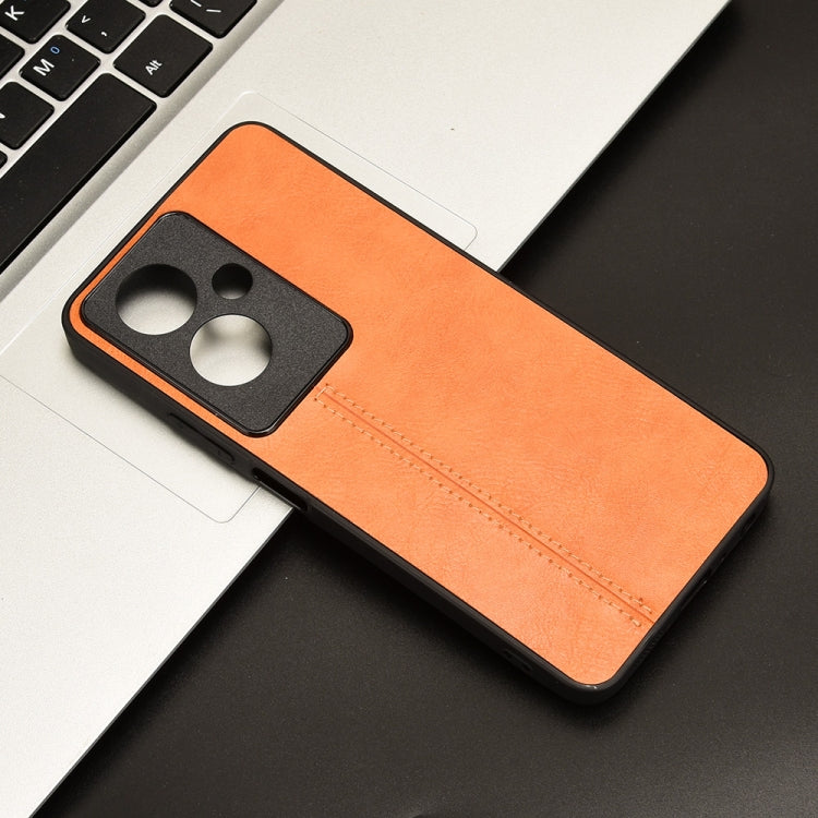 Orange cow pattern sewing back cover phone case for OPPO A79 5G, showcasing its stylish design and durable materials.