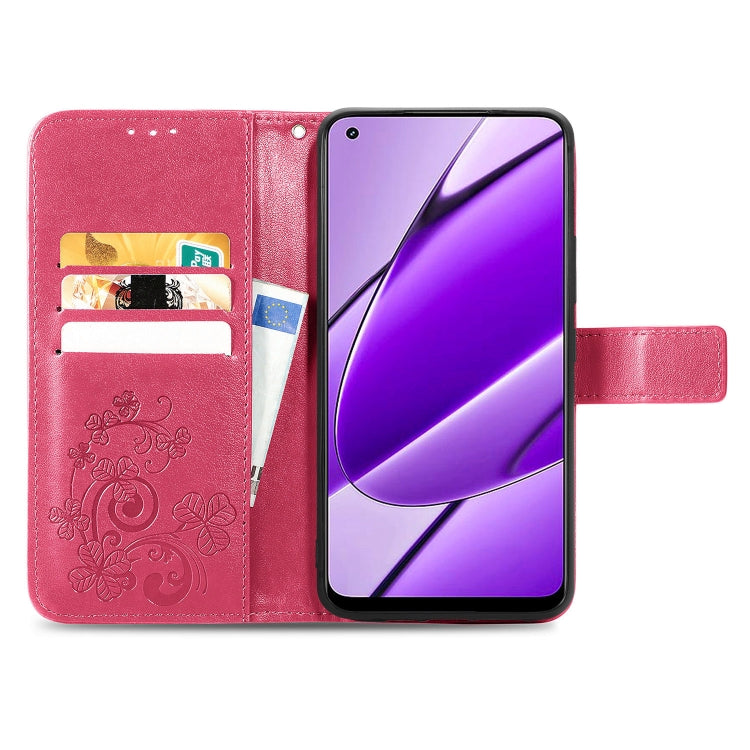 For Realme 11 4G leather phone case featuring a four-leaf clover embossed design and a buckle, showcasing its elegant and functional features.