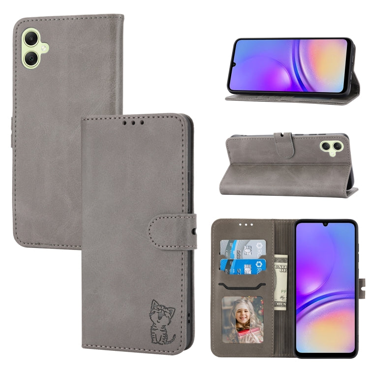 For Samsung Galaxy A05 flip leather phone case featuring an embossed Happy Cat pattern, showcasing its stylish design and functional features.