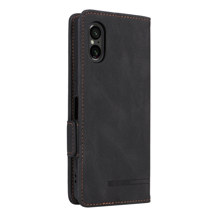Black magnetic clasp leather phone case for Sony Xperia 5 V, showcasing its elegant design and functional features.