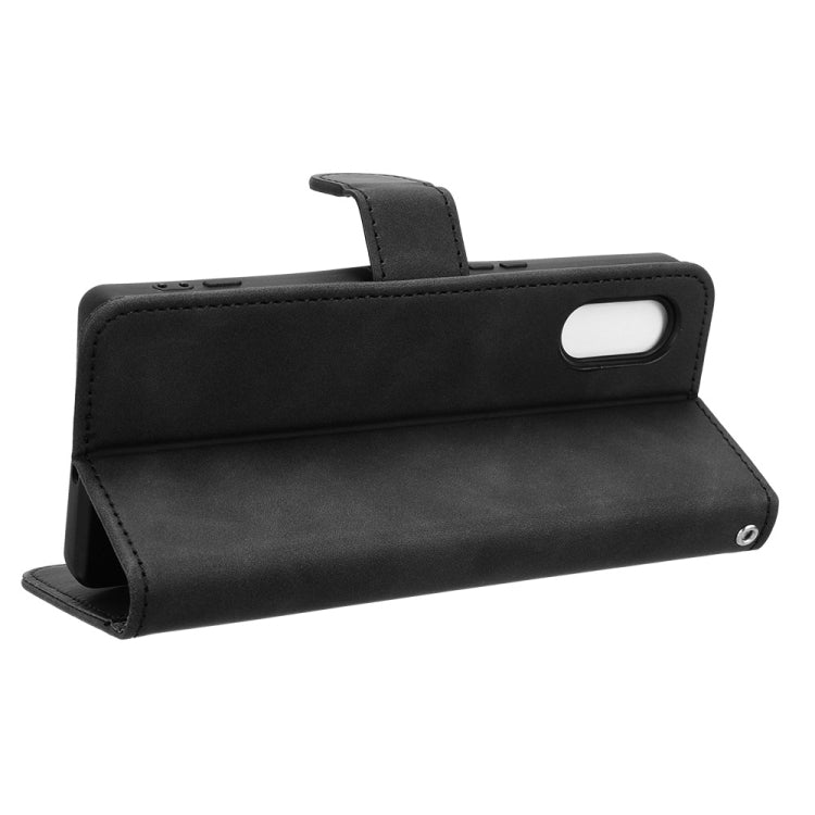 For Sony Xperia 5 V 2023 magnetic flip leather phone case in black, showcasing its sleek design and card slots.