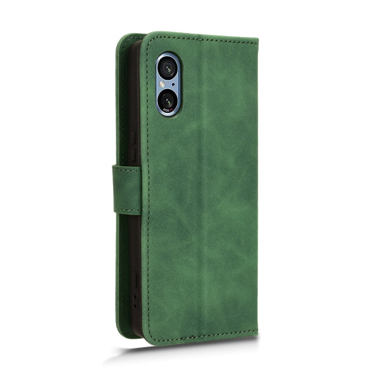 For Sony Xperia 5 V 2023 Skin Feel Magnetic Flip Leather Phone Case in black, showcasing its sleek design and card slots.