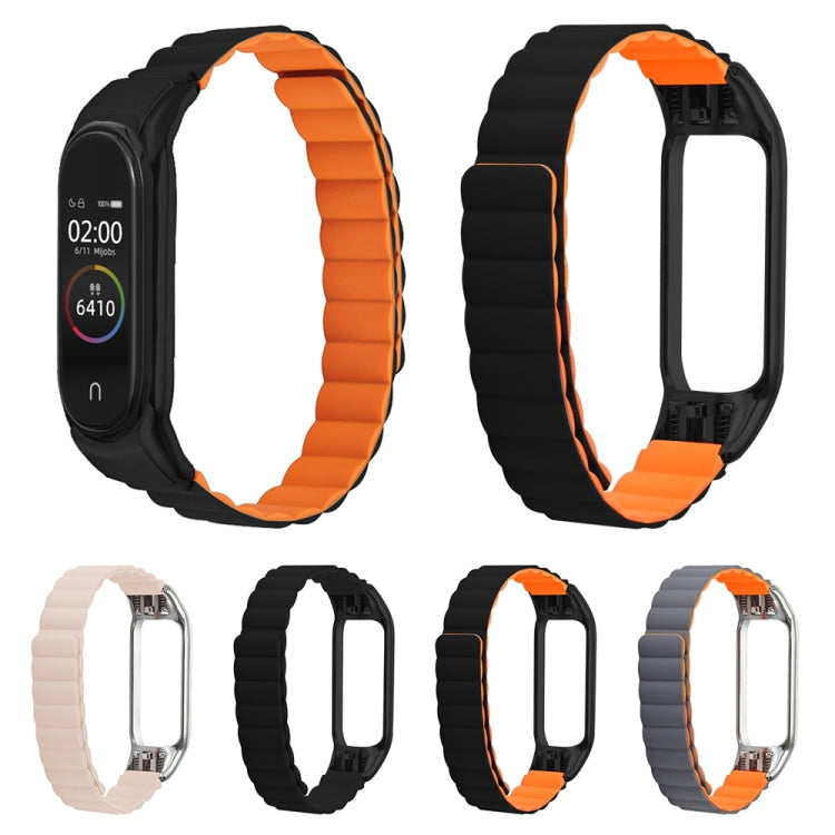 Pink silicone magnetic watch band for Xiaomi Mi Band 4 and 3, showcasing its soft texture and stylish design.