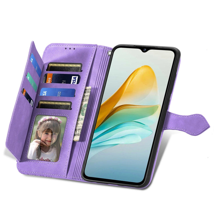 Purple embossed flower zipper leather phone case designed for ZTE Blade A53, showcasing its stylish design and practical features.