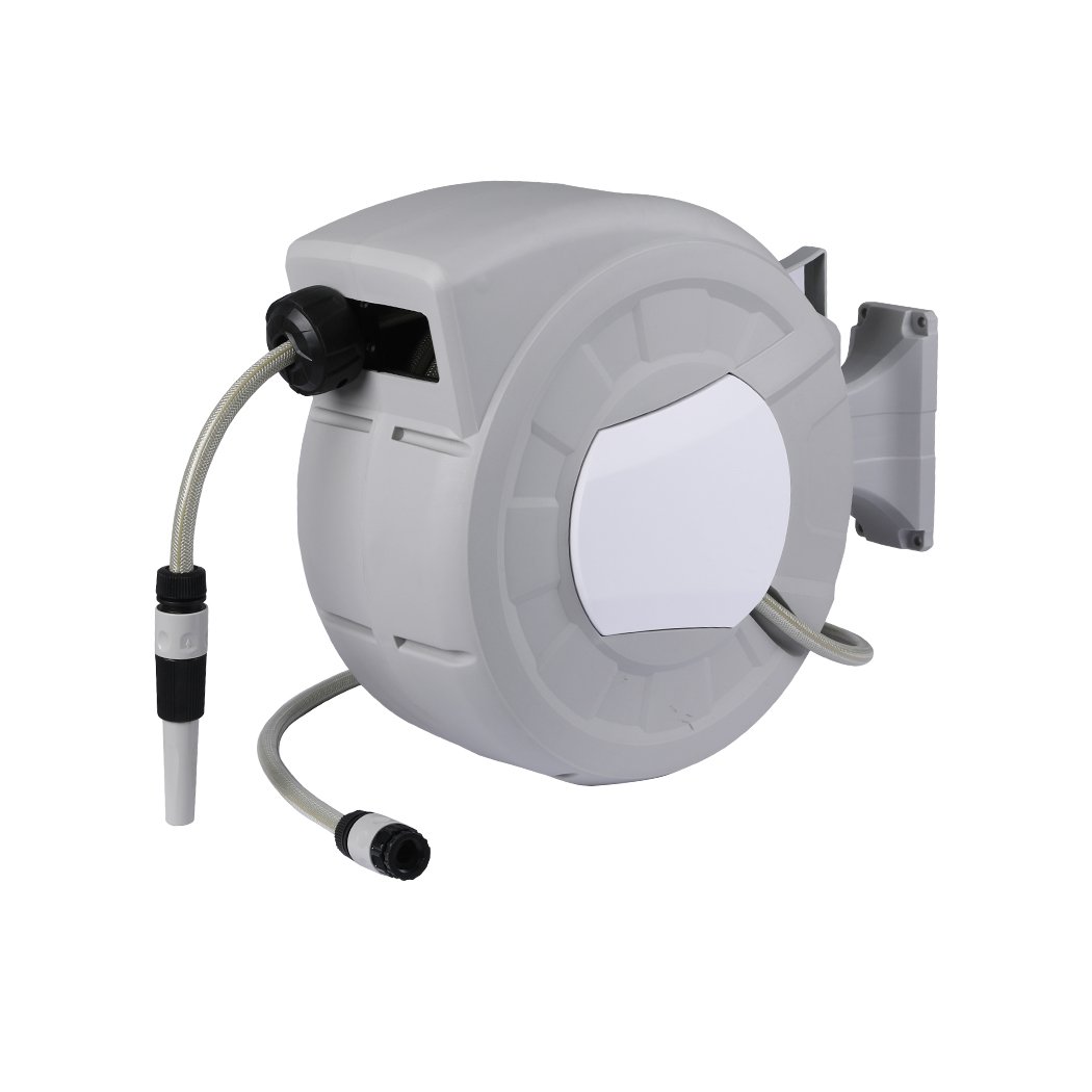 Retractable garden hose reel with spray gun nozzle mounted on a wall, showcasing its ergonomic design and durable construction.