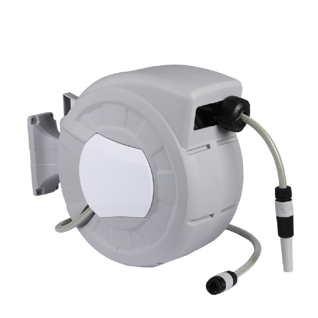 Retractable garden hose reel with spray gun nozzle mounted on a wall, showcasing its ergonomic design and durable construction.