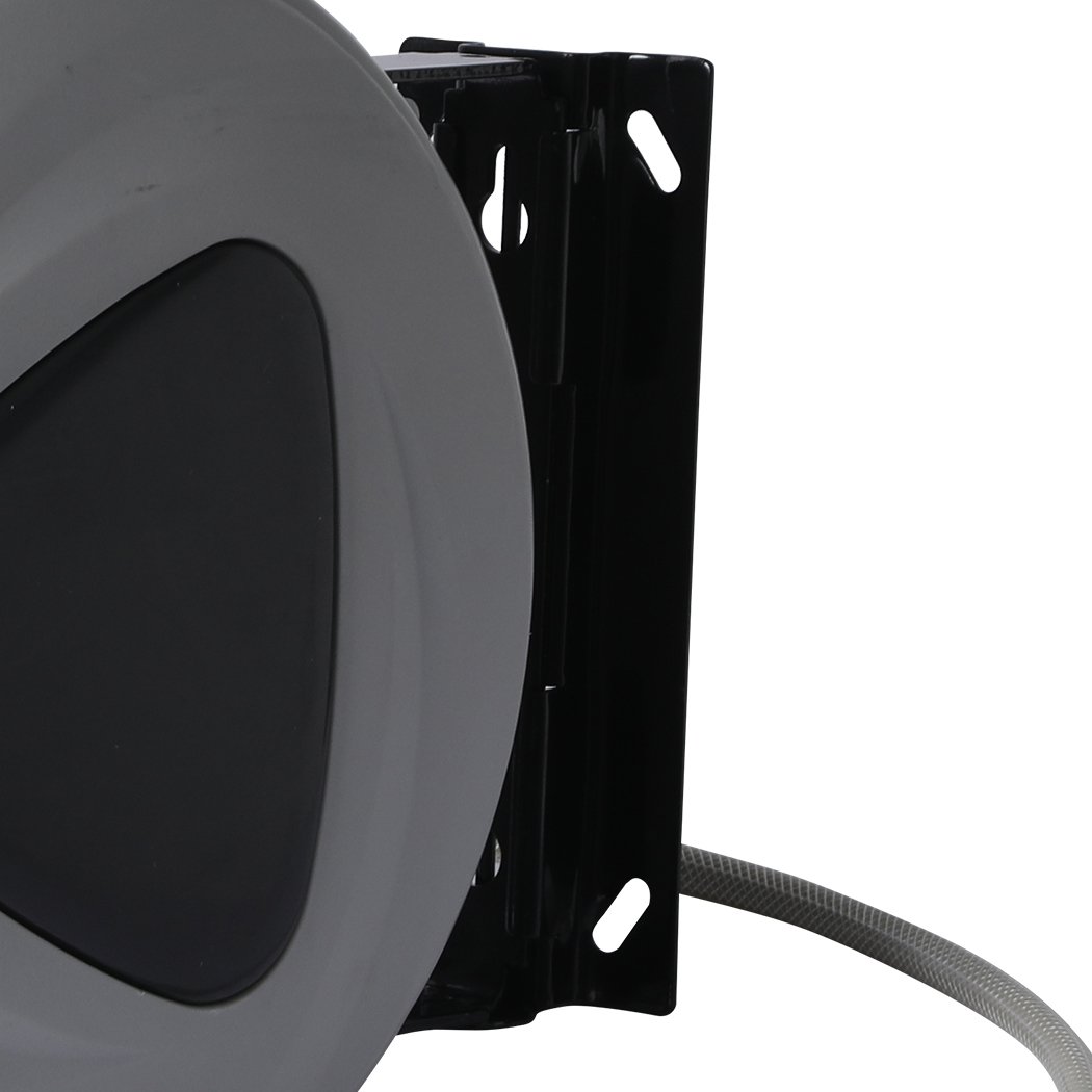 Retractable garden hose reel with spray gun nozzle and wall bracket, showcasing its durable design and ergonomic features.