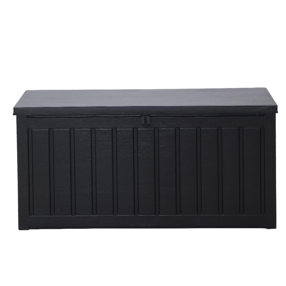 Gardeon 240L Outdoor Storage Box in black, featuring a lockable lid and aluminum hinge, used as a bench seat in a garden setting.